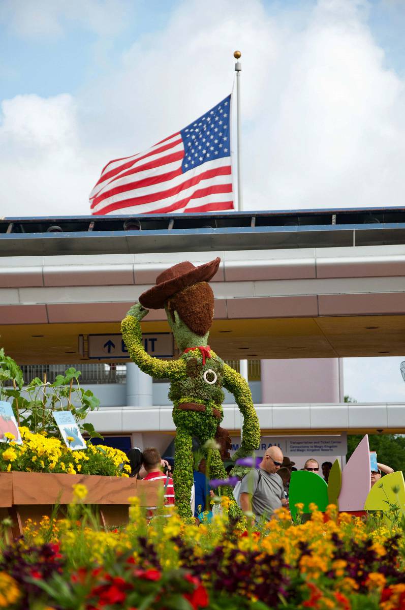epcot center drive brown and green dragon statue orlando